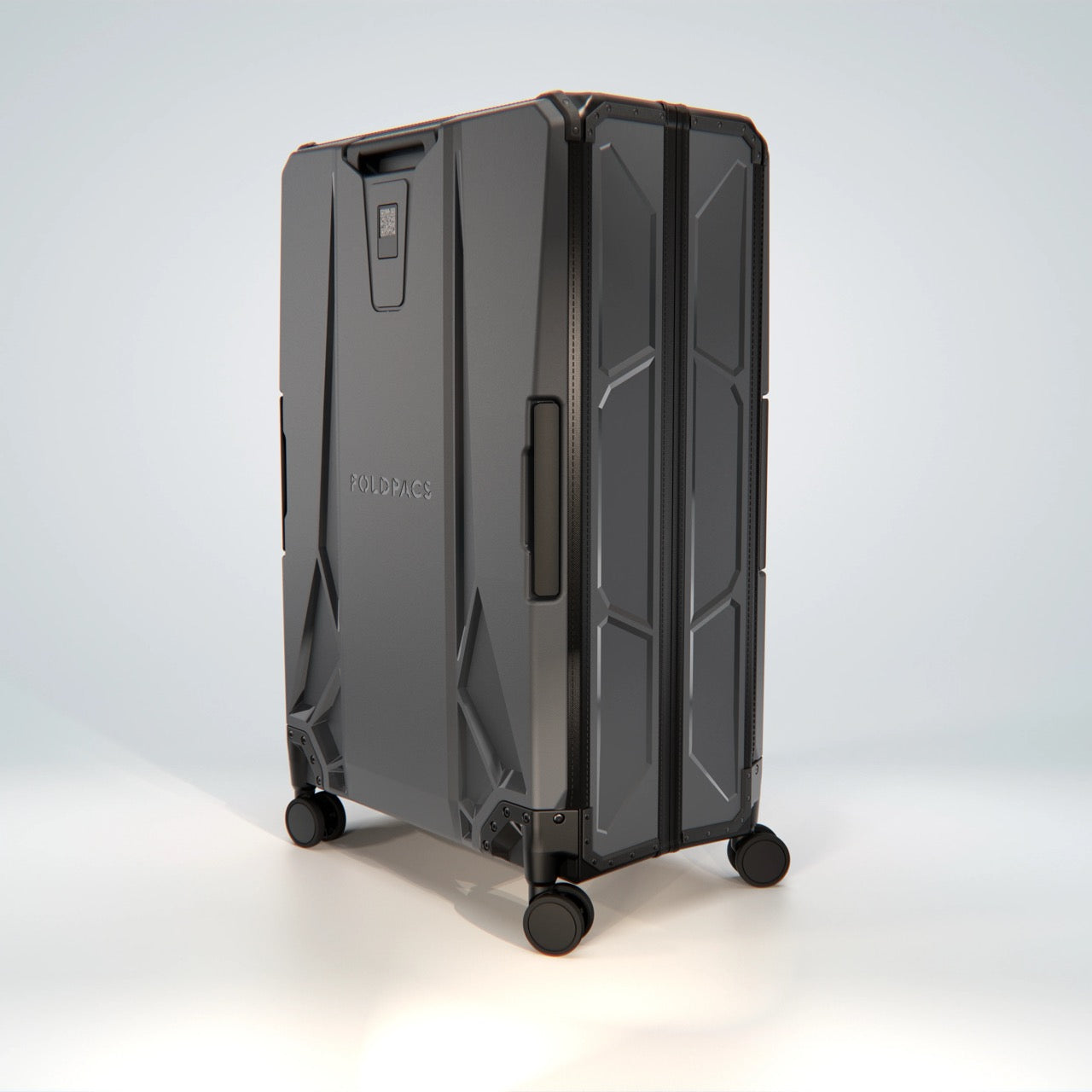 Anthracite FOLDPACS suitcase in three-quarter view on four spinner wheels