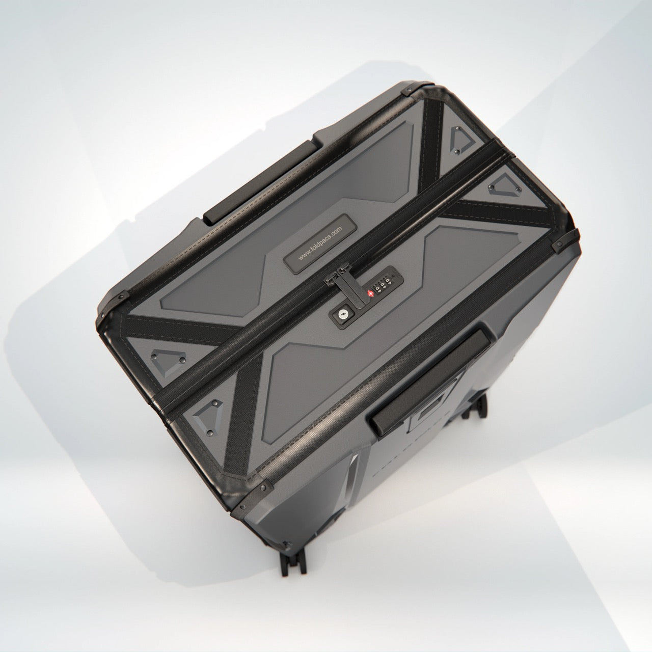 Anthracite FOLDPACS hard-shell suitcase closed, seen from above at an angle