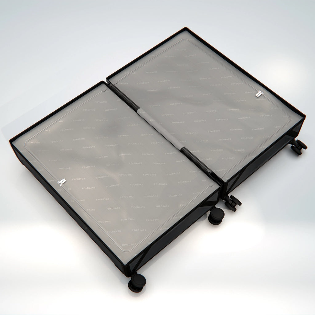 Open anthracite FOLDPACS suitcase lying flat, showing both packing compartments